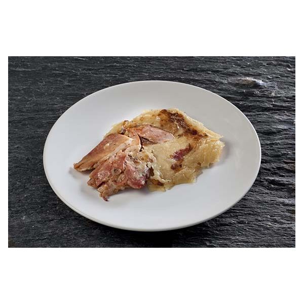 Jamón con hueso gratinado dauphinois